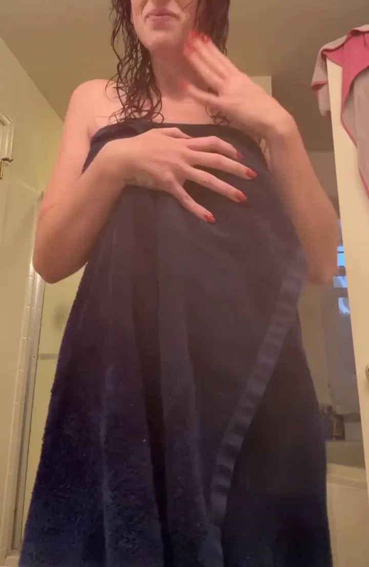 Showing off what's under mommy's robe..