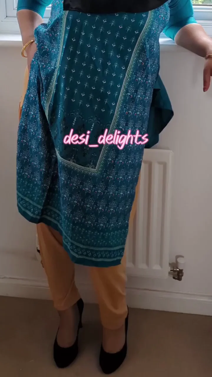 Kurti-Clad Busty Bhabhi Teasing Her Massive Tits