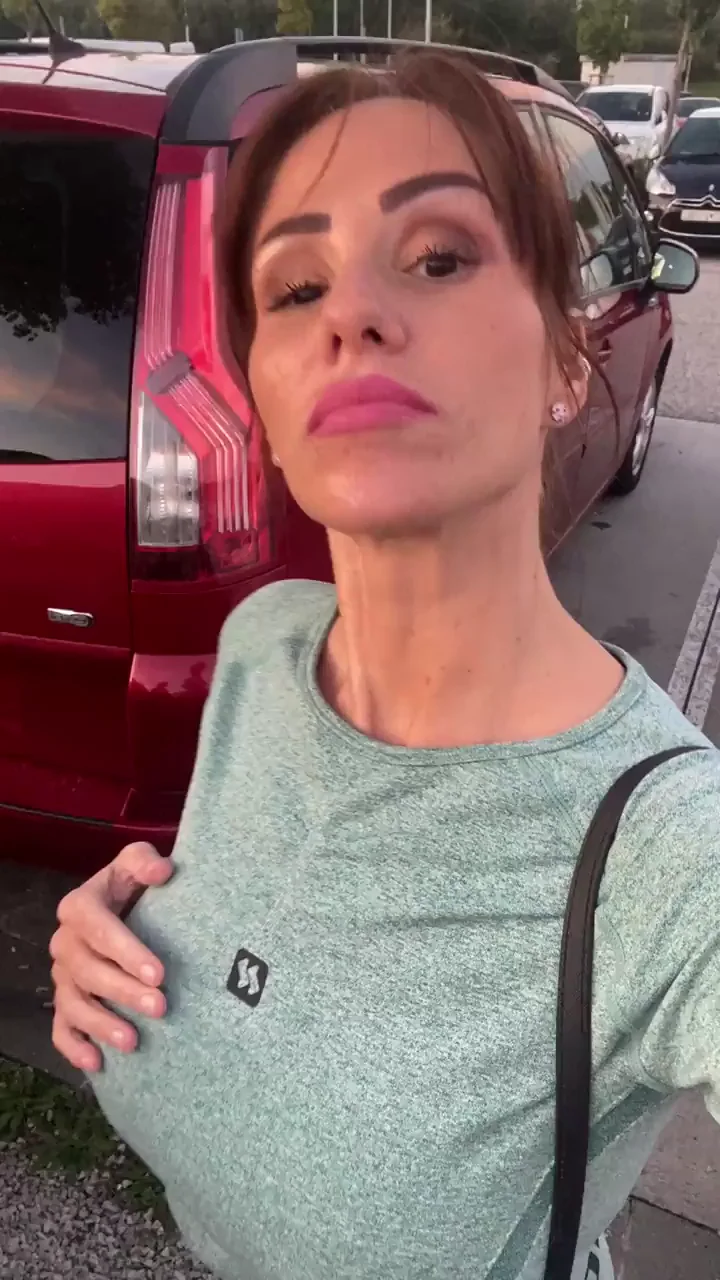 🔥 Sneaky Outdoor Tit Tease in Parking Lot GIF 😈