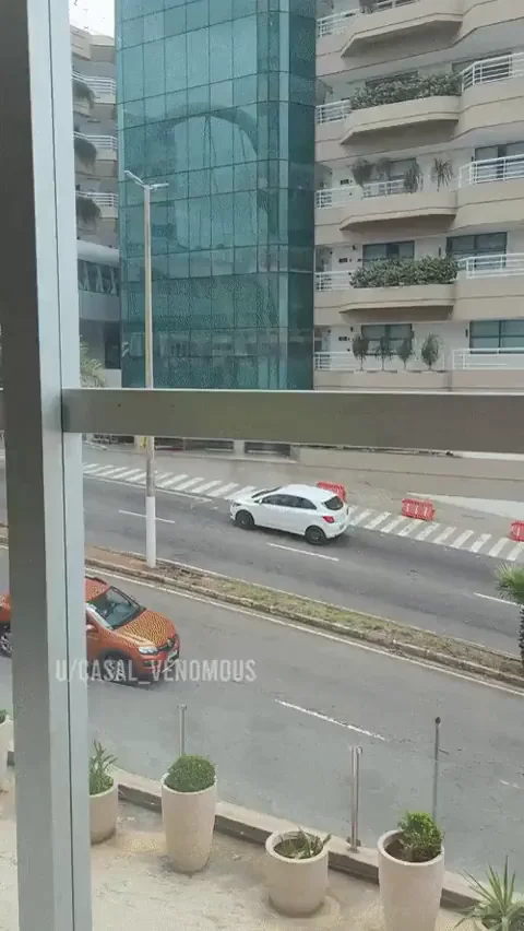 Showing my tits through the window. [GIF]