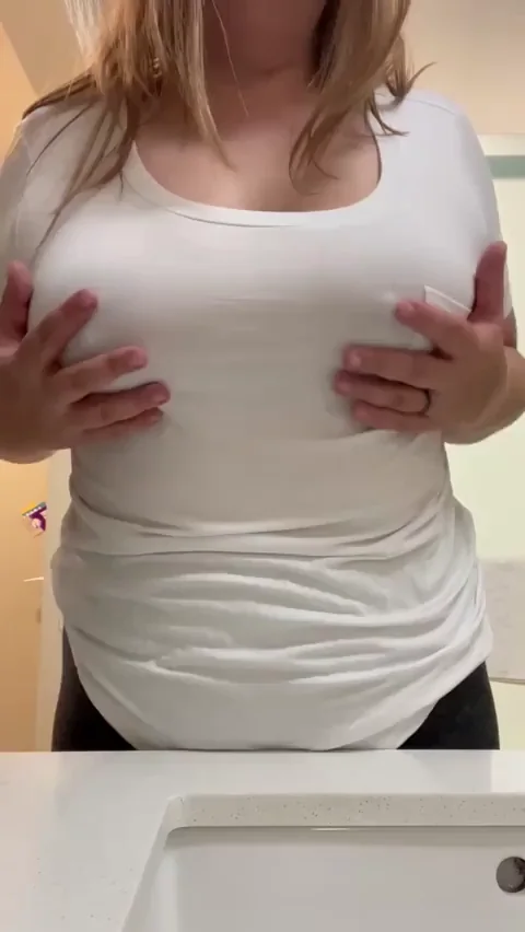 MILF's Bracless Tease: Tits Out in Tight White Top