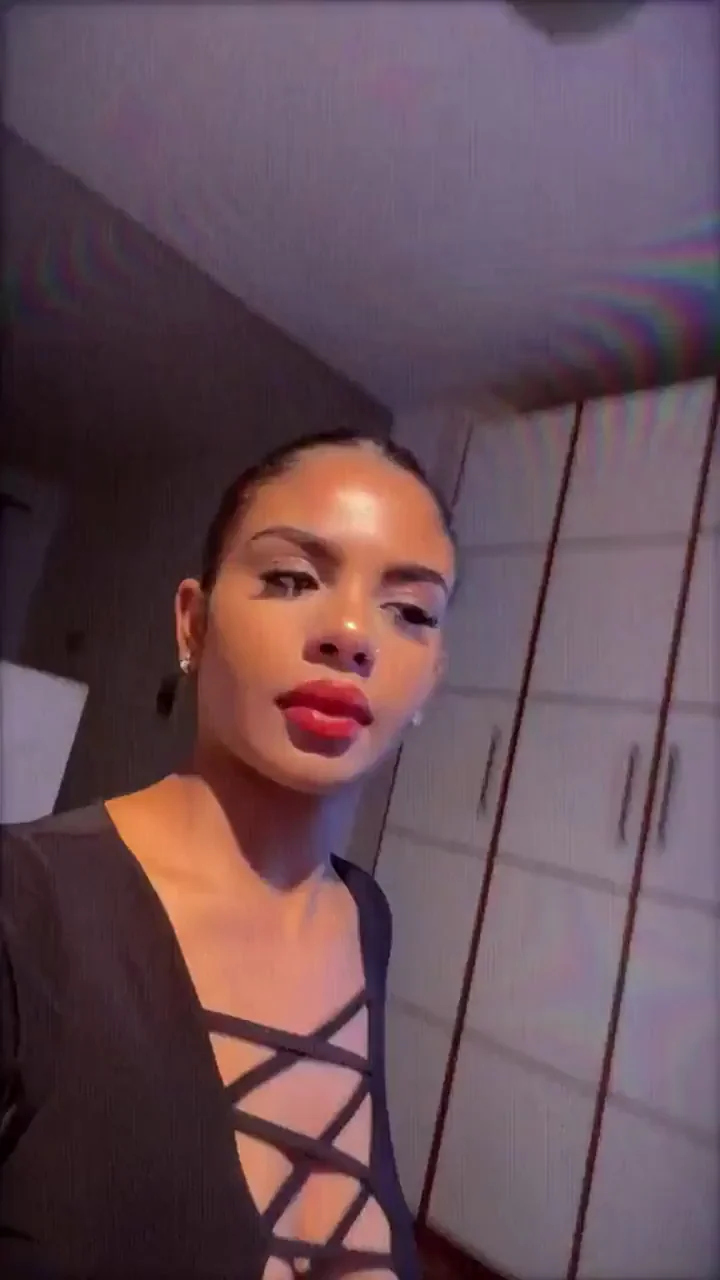 Ebony Bombshell Teases Her Perky Rack in Lace-Up Tease