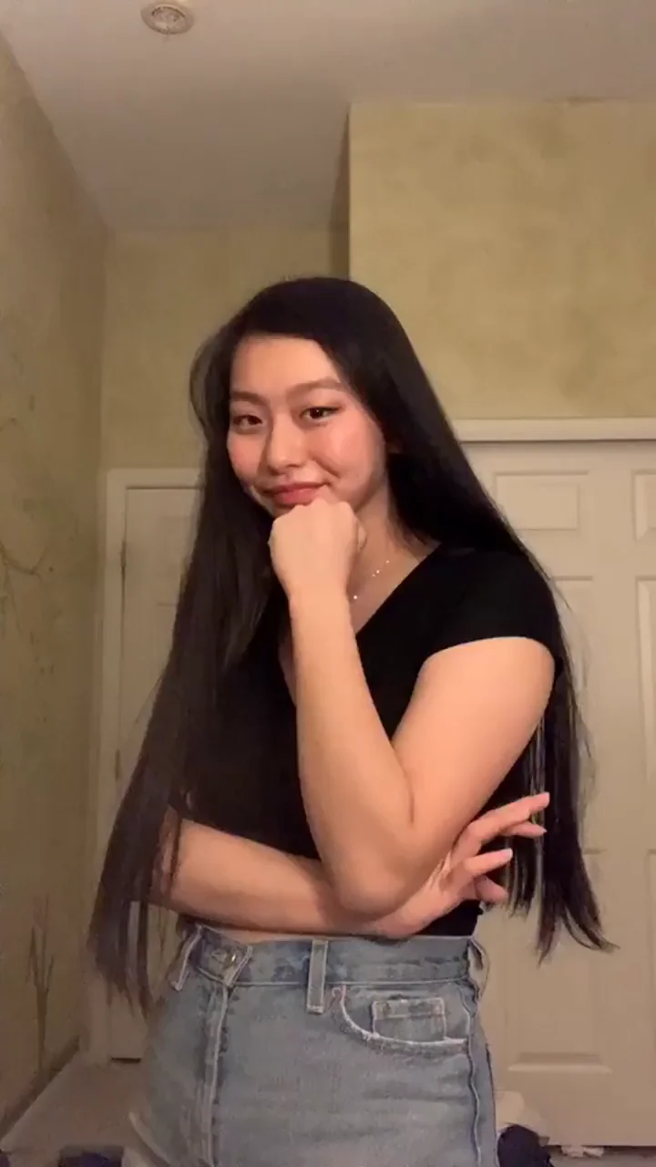 Busty Asian Teen OL77 Teases with Massive Tits in Tight Top