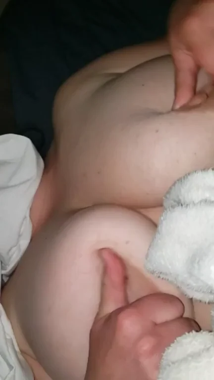 Rubbing her tits as she gets fucked