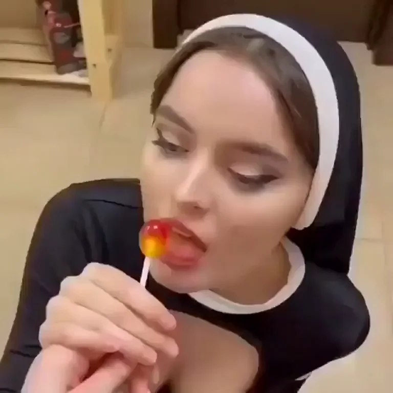 Naughty Nun Slut Sucks Lollipop Tease with Massive Tits