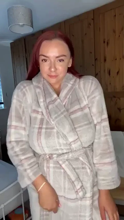 Redhead Slut Twirls and Flashes Her Massive Tits in Plaid Robe