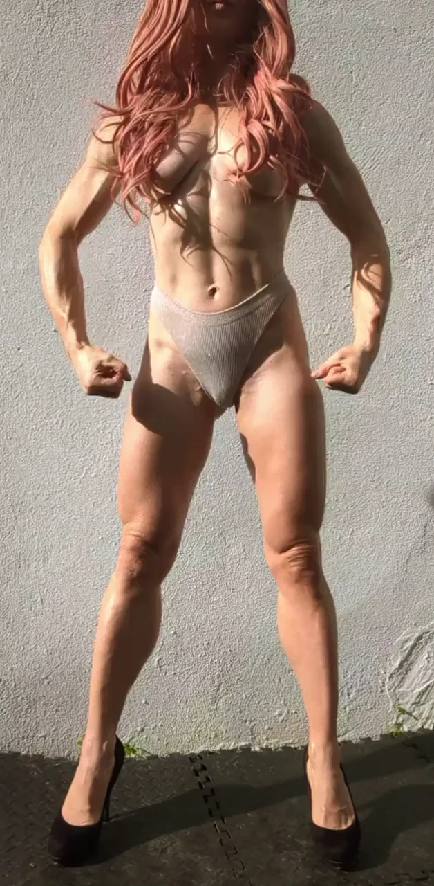 Pink-Haired Muscle Goddess Flexes Her Power Pussy