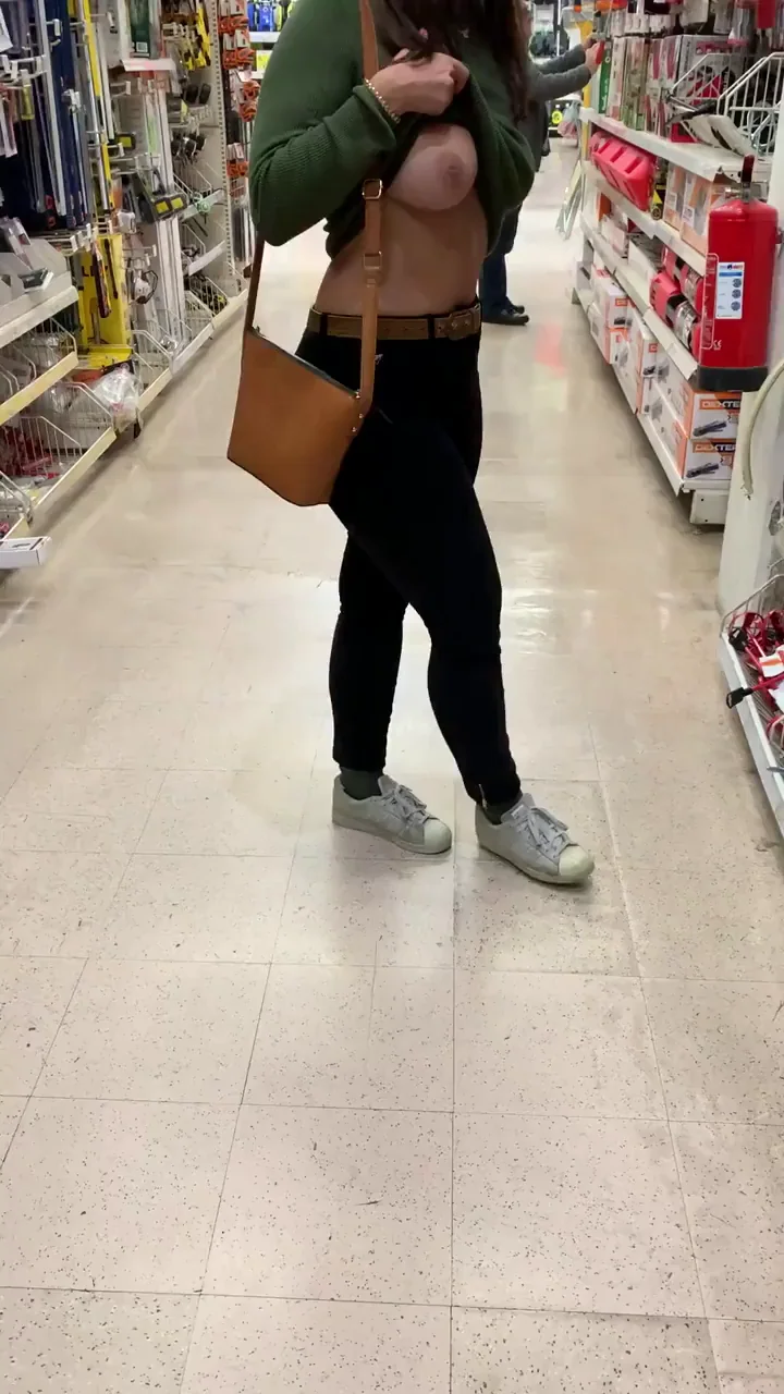 Nervous Slut Flashes Perky Tits in Hardware Store Aisle