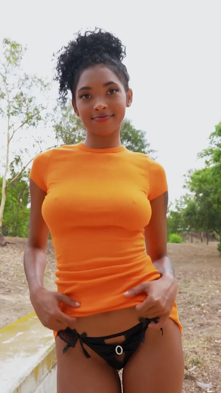 Ebony Teen's Hypnotic Tits Bounce Wild in Tight Orange Tee!