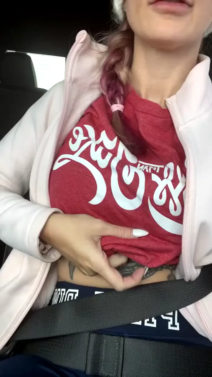 Teasing my tits while driving