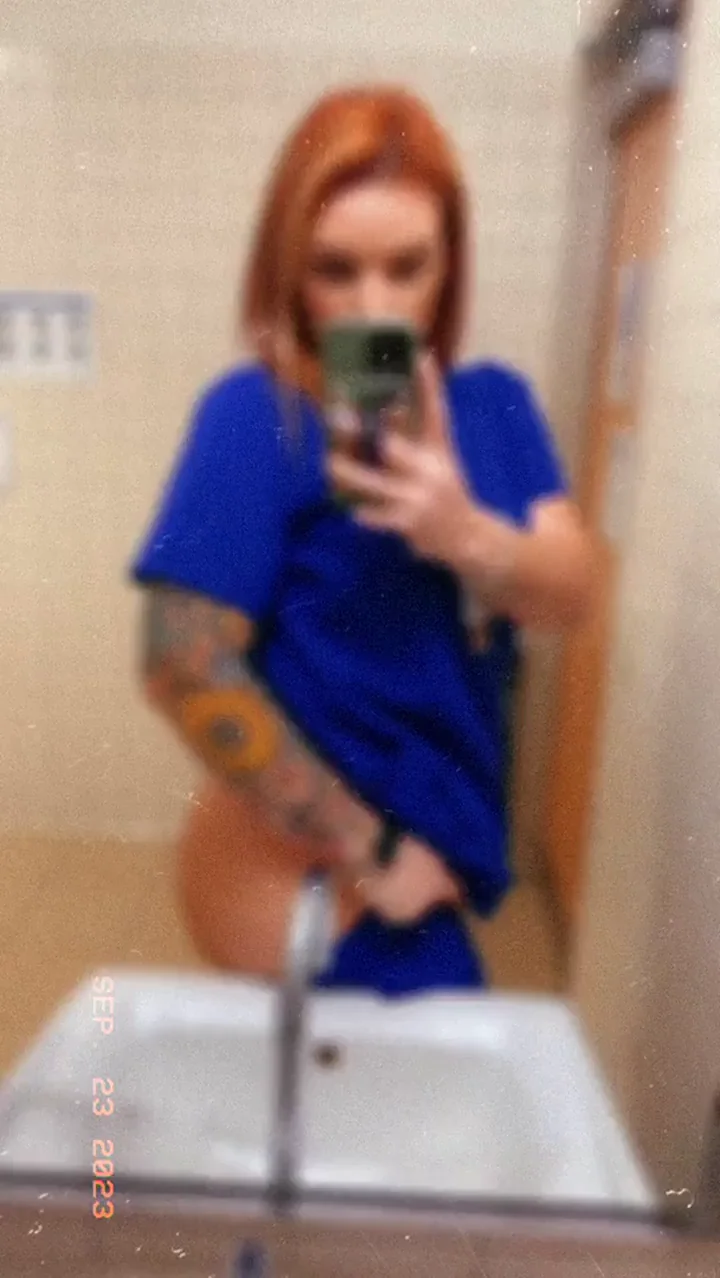 Nurse's Scrub Tease: Fiery Redhead Spreads Thick Thighs in Bathroom Bliss