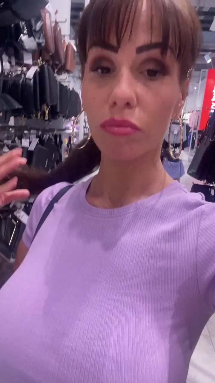 Showing off my tits at the grocery store [GIF]
