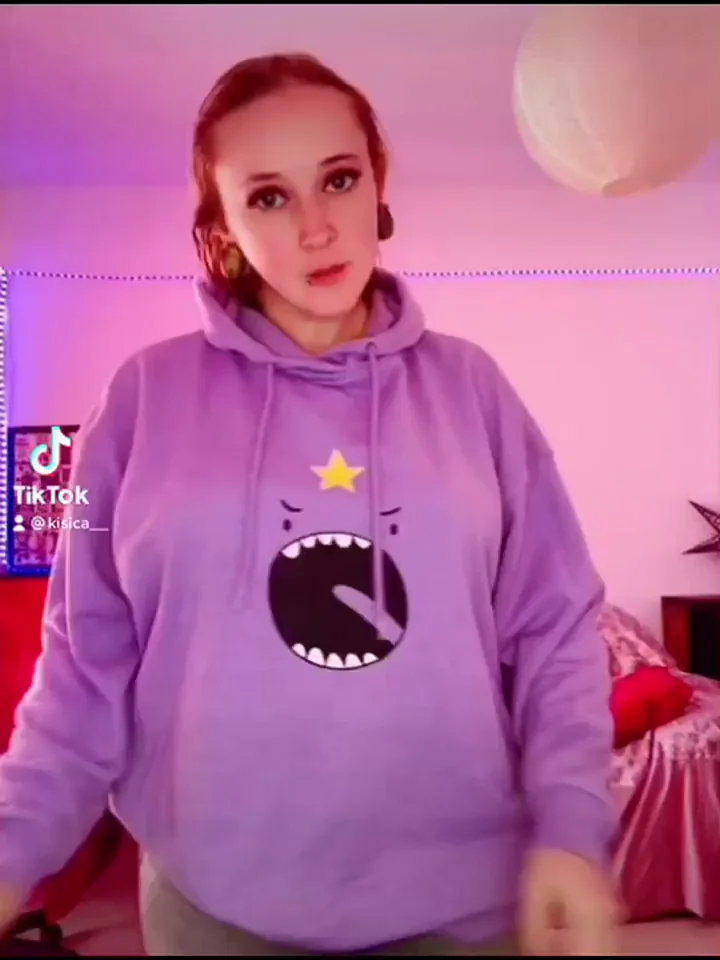 TikTok Slut's Purple Hoodie Tease in Candy-Colored Bedroom
