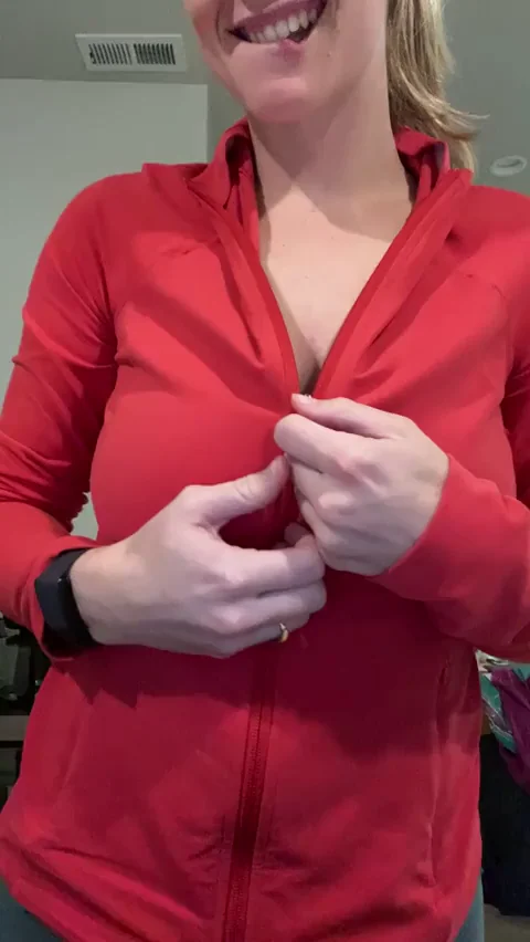 Hot Blonde Tease Slowly Unzips Red Hoodie to Flash Massive Tits