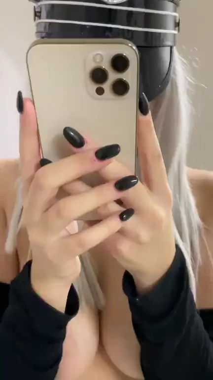 iPhone Tease: Masked Slut's Cleavage Bait for Free Nudes