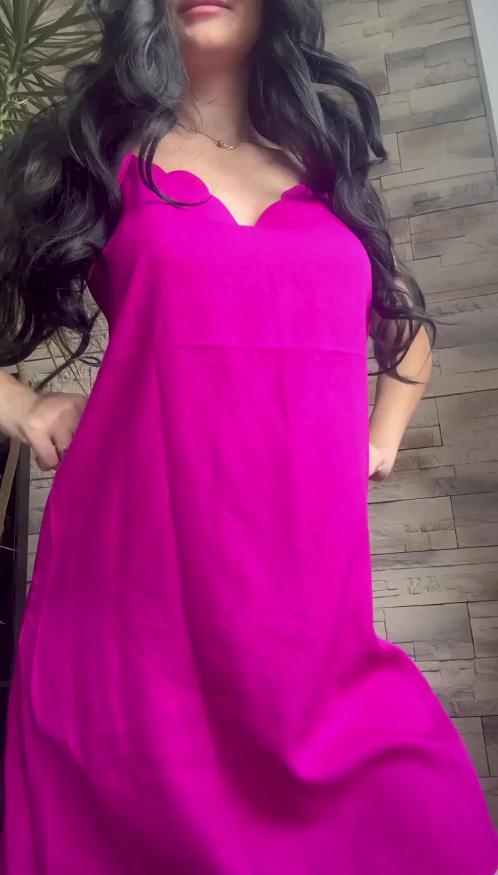 Deceptive Curves: Pink Dress Tease Begs for a Chance