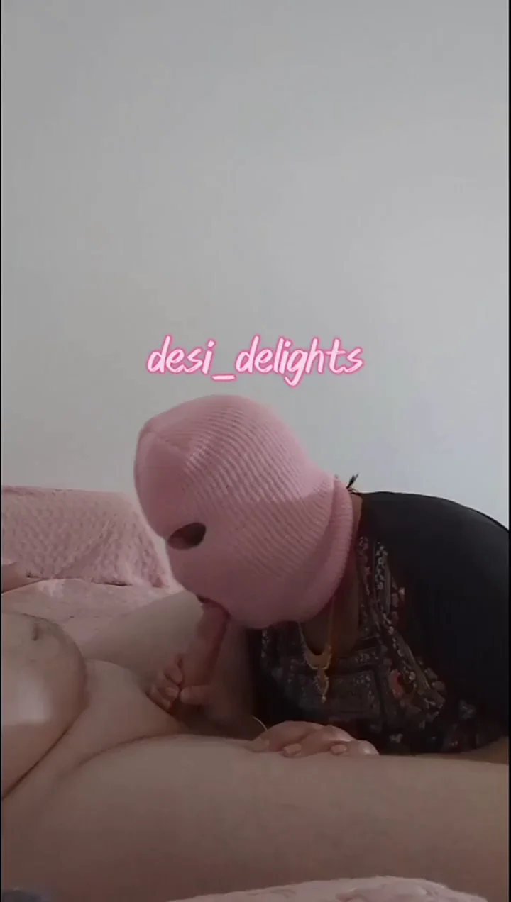 Desi Bhabi Slurps on Thick Lollipop in Pink Balaclava
