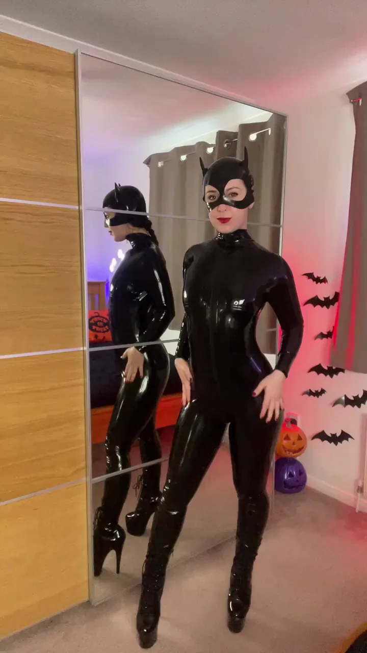 Latex Kitty Cat Tease: Shiny Curves Begging to Pounce