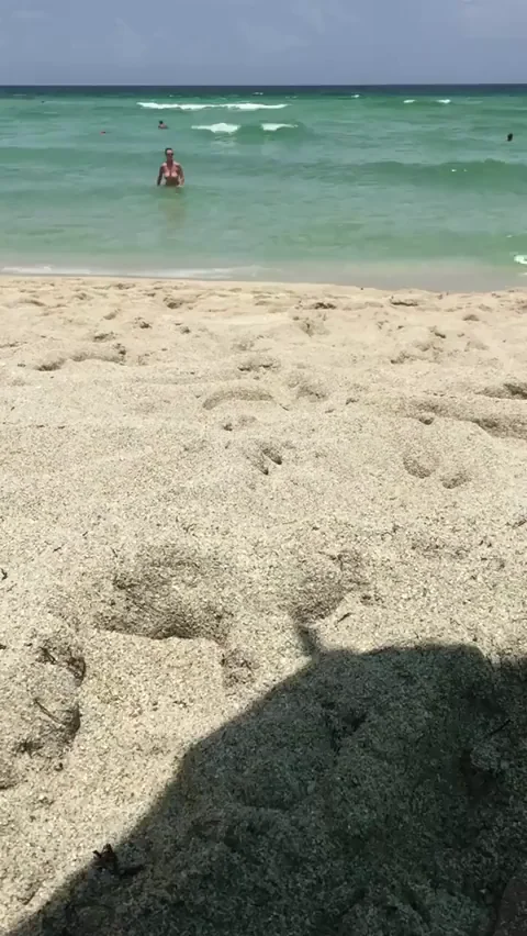 She makes me so proud! My wife making sure several guys are looking at her before she walks out of the water at Haulover.