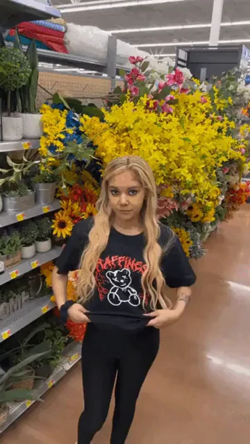 Walmart Flower Slut Teases Her Dripping Petals in Public Aisle