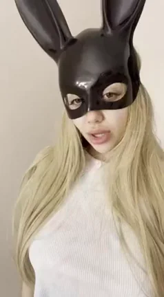 Abby Tatum's Bunny Mask Tease: Lifting White Tee for Massive Tits Reveal