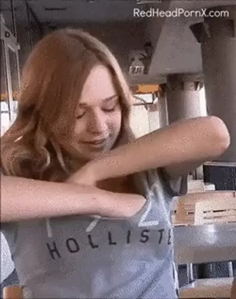 A Cute Redhead Flashing Her Tits in Public