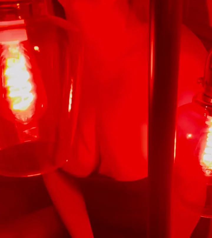 Red Light Seduction: MILF's Massive Tits Spill Out in Homemade Downblouse Tease