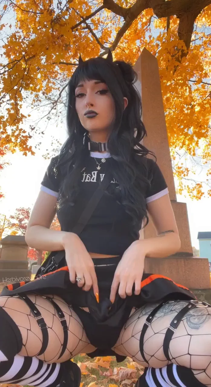 spooky bitch in a graveyard