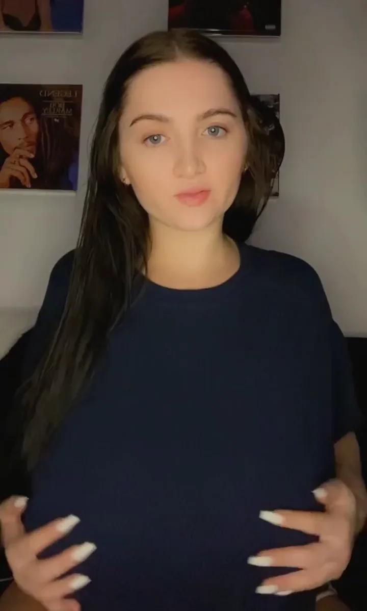 Ghost Nipple Tease: Brunette Babe's Massive Tits Peek Through