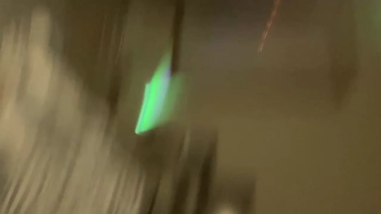Close up view from behind of petite college girl gripping thick cock
