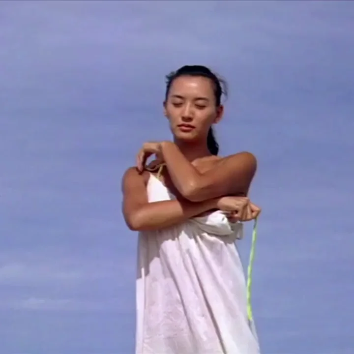 Monica Mok's Ocean Flame: Topless Tease & Beachside Passion