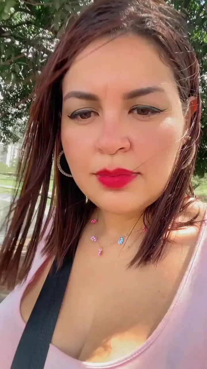 Latina MILF's Epic Knockers Bursting Out in Pink Tease