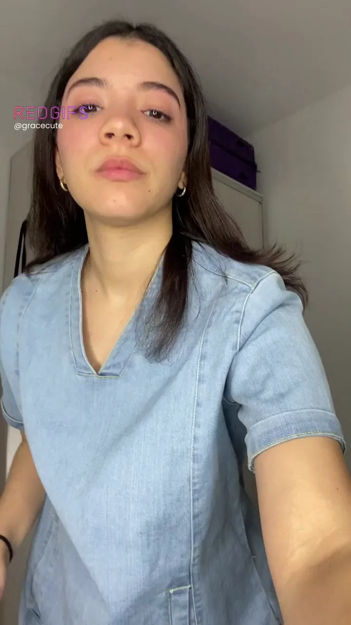 Naughty Nurse Flashes Her Perky Tits in Scrubs Tease