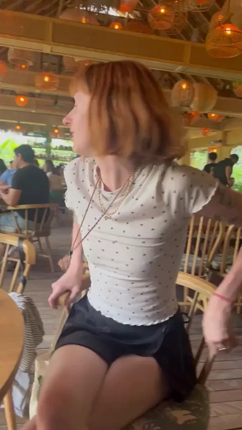 Redhead Slut Flashes Tits in Busy Beach Cafe 😈👙🔥
