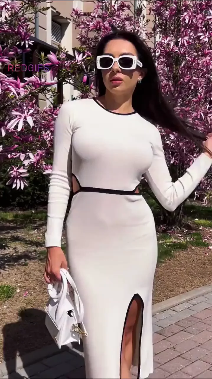 Busty by the blossoms