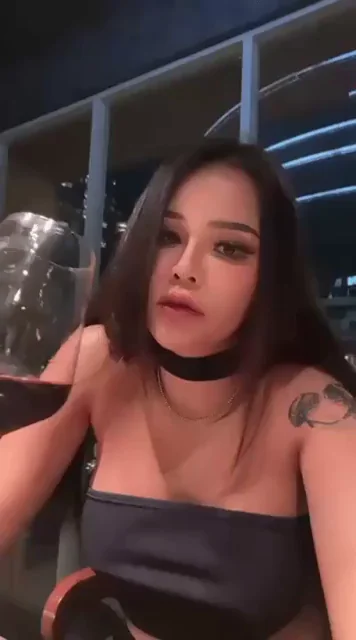 Toasting with Tits Out, Asian Babe Cheers Her Cleavage