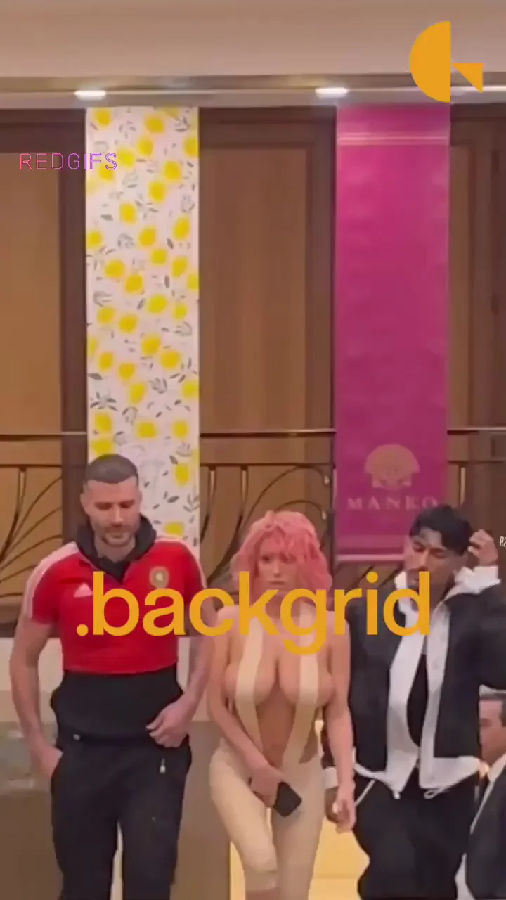 Bianca Censori's Slutty Tape Bodysuit: Tits Spilling Out in Public Tease