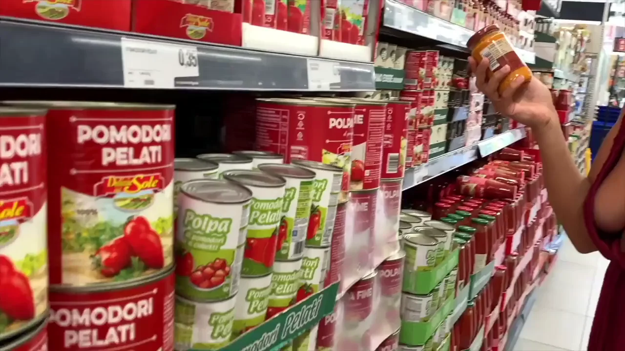 Supermarket Slut Flaunts Massive Tits in Pringles Aisle