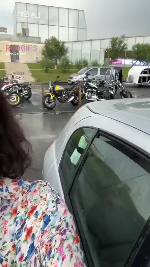 Naked Slut Flashing Tits in Rainy Public Parking Lot Near Bikers