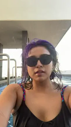 Worth the Risk: Rooftop Pool Tits Flash! 😈💦 [GIF]