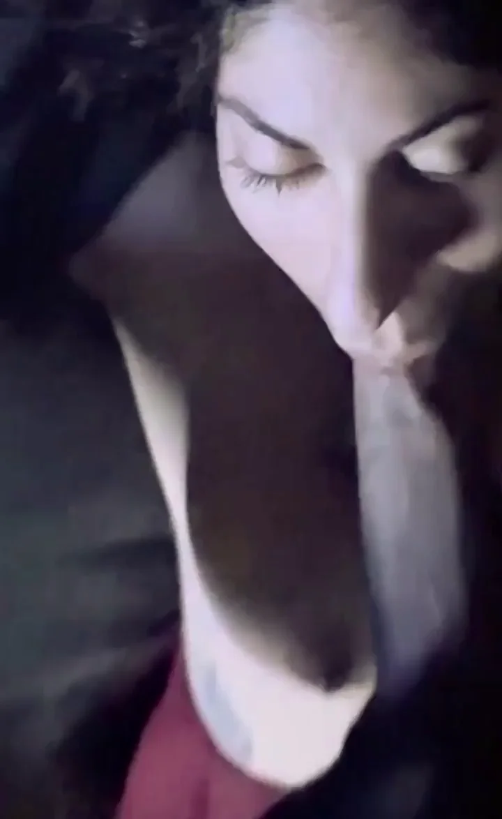 Trying to suck a cock as long as her torso
