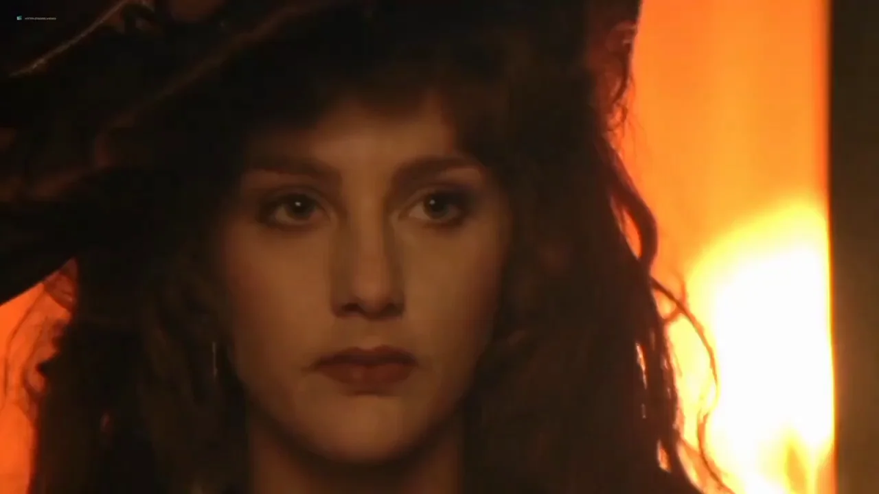 Jenny Wright's Steamy Saloon Tease in Young Guns II 🔥🍑