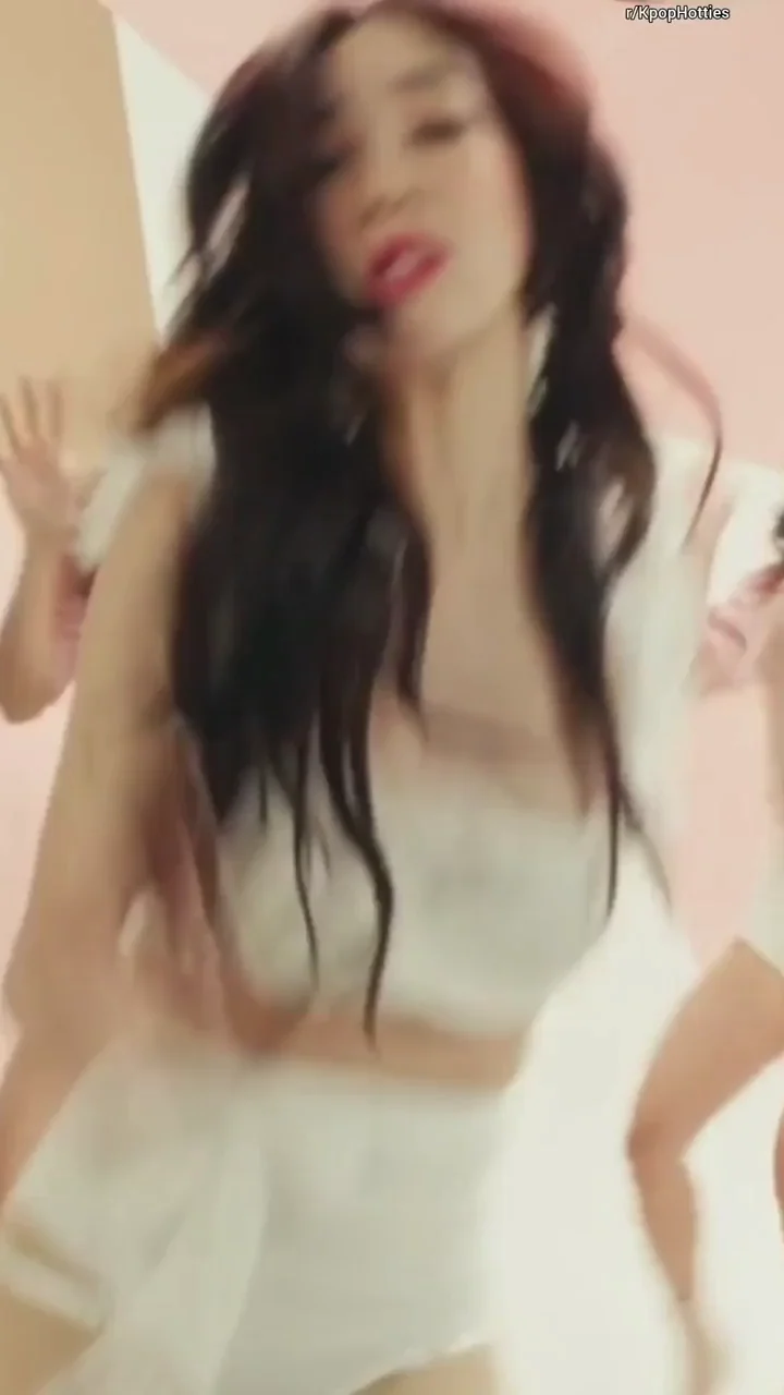 Tiffany Young's Slutty Asian Tease: Curves, Cleavage & Cock-Teasing Poses