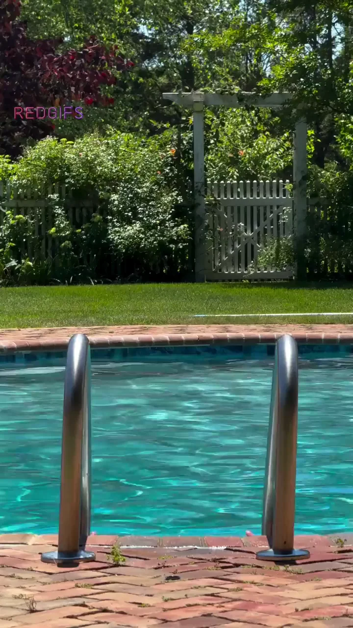 Briana Smith's Poolside Tit Tease in Sultry Bikini