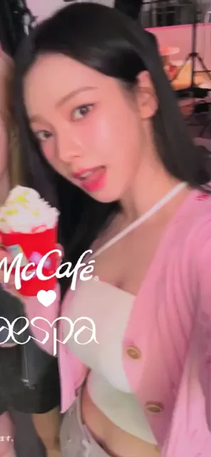 Karina from aespa Sipping Creamy McCafe in Slutty Pink Cardigan