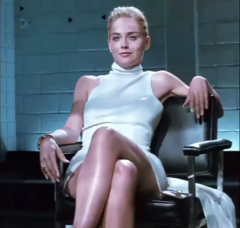 Sharon Stone's Basic Instinct Tease: Legs Spread, White Dress Dripping Seduction