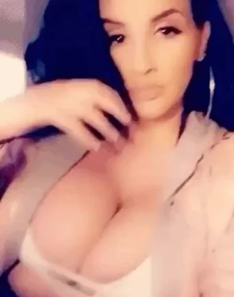 Wink & Tease: MILF's Massive Cleavage Bombshell
