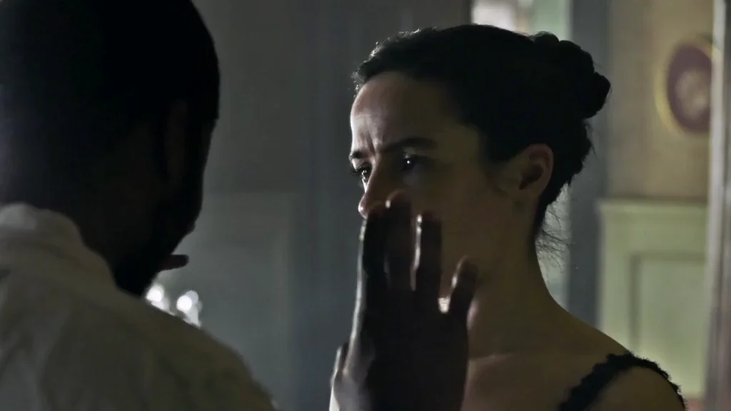 Laura Donnelly's Steamy Nevers Nude Tease: Corset Cleavage & Sultry Licks