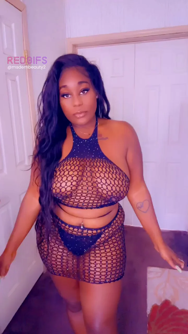 Thick Ebony Babe Teases in See-Through Fishnet Bodysuit