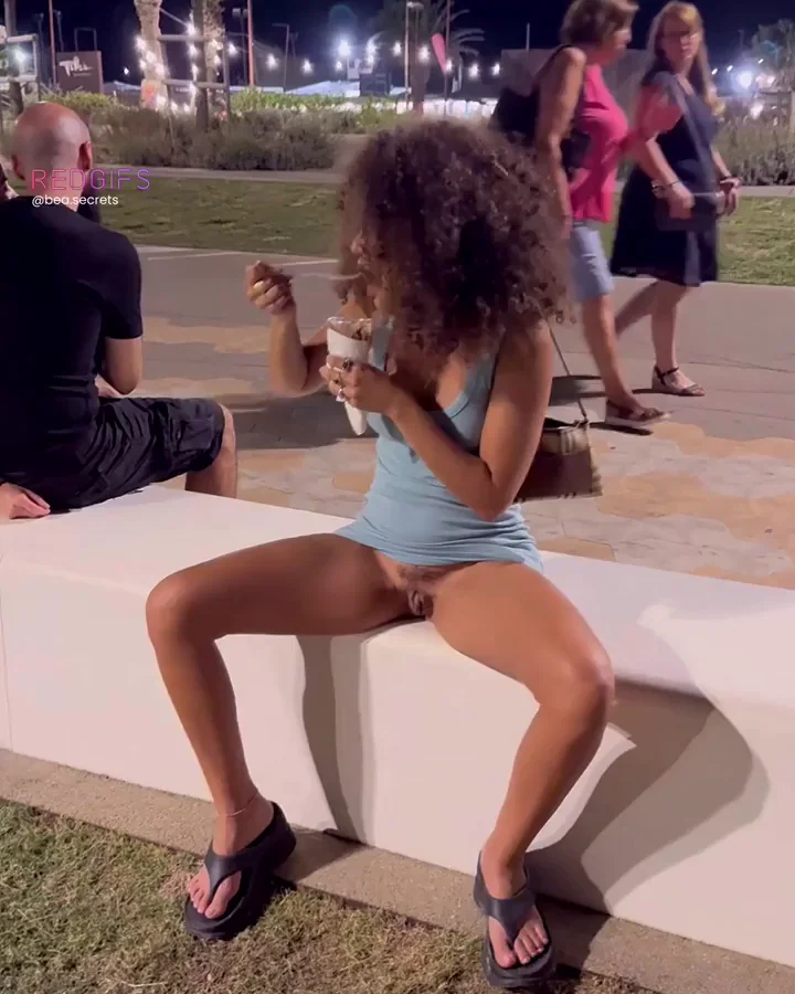 Curly-Haired Slut Flashes Dripping Pussy in Public Park - Ice Cream Tease!